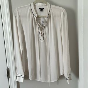 Ann Taylor white/cream long sleeve blouse with black trimmings in size M